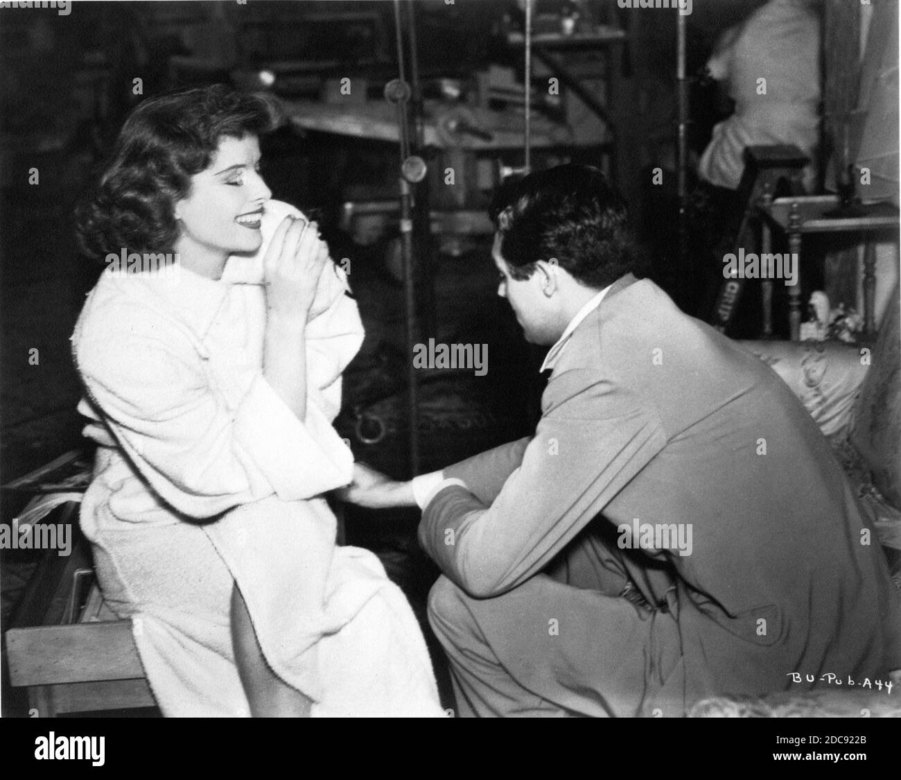 KATHARINE HEPBURN and CARY GRANT on set candid during filming of BRINGING  UP BABY 1938 director HOWARD HAWKS RKO Radio Pictures Stock Photo - Alamy, image size:1300x1125