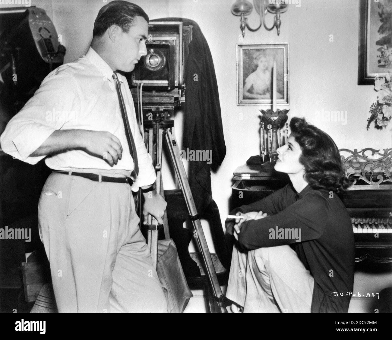 Cinematographer RUSSELL METTY and KATHARINE HEPBURN on set candid