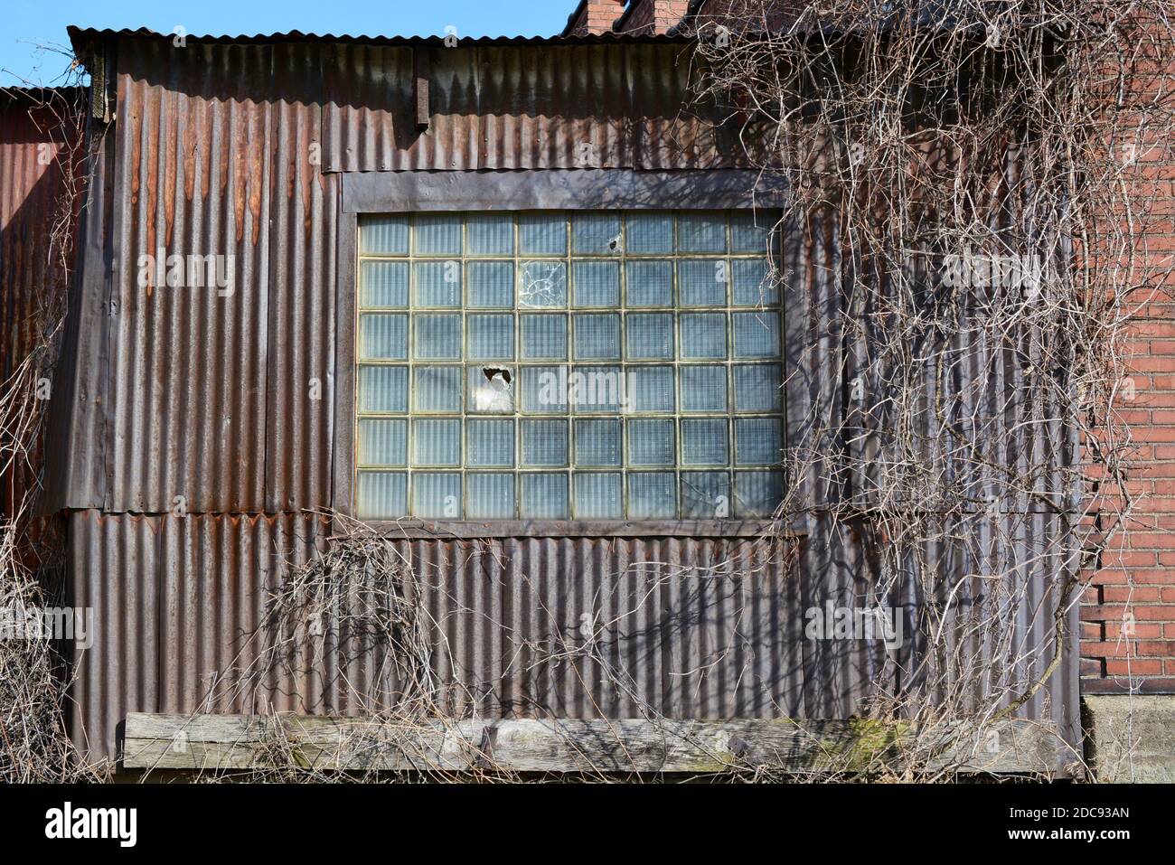 rusty metal warehouse building wall and glass window Stock Photo Alamy