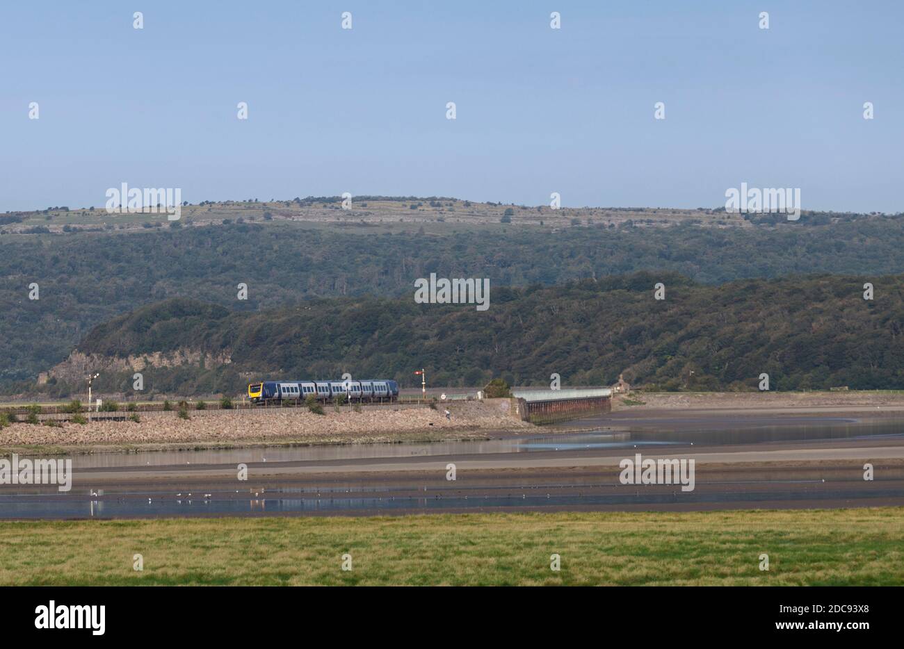 Northern rail CAF class195 train crossing Arnside viaduct across the ...