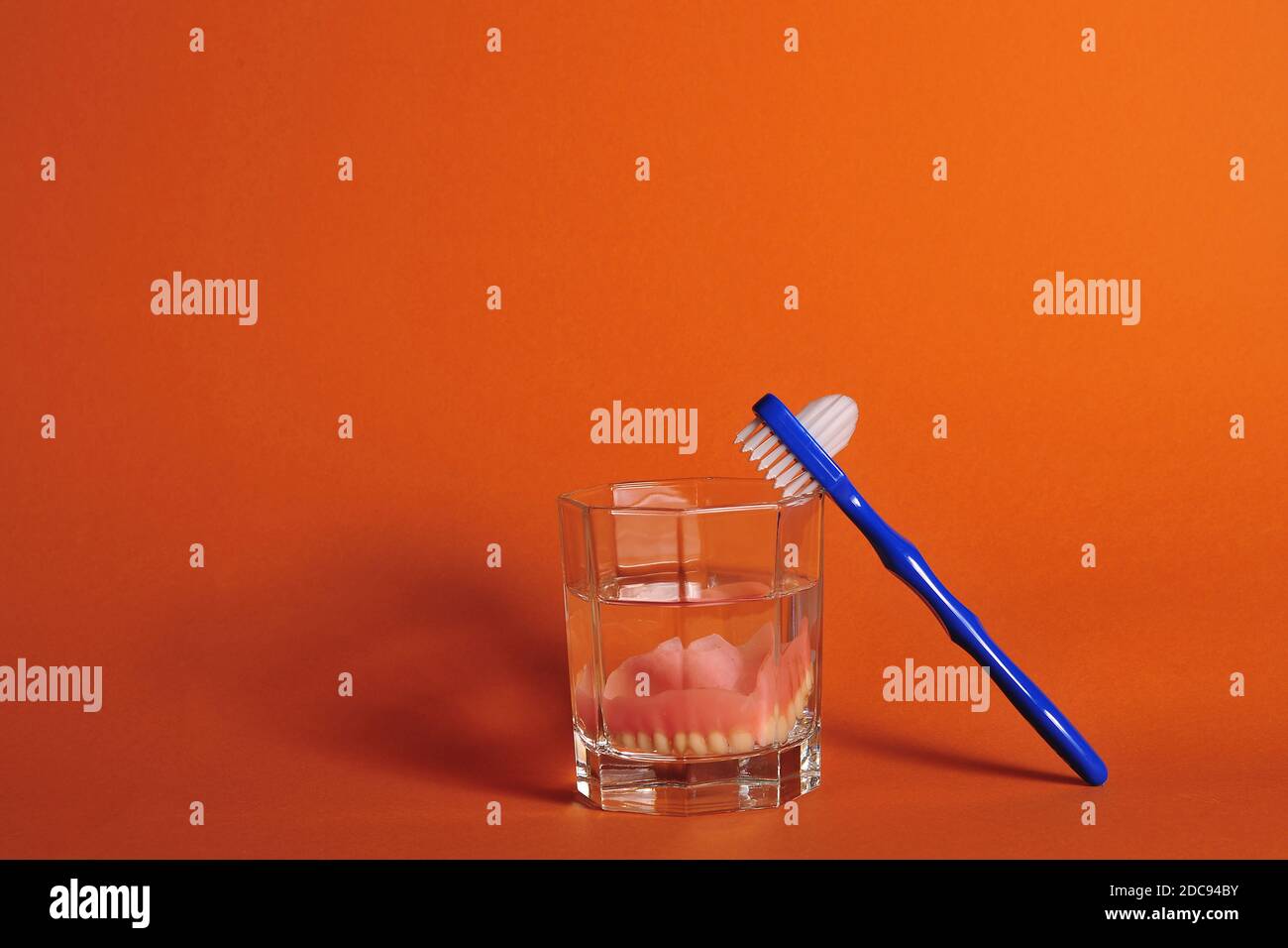 dentures and cleaning brush Stock Photo Alamy