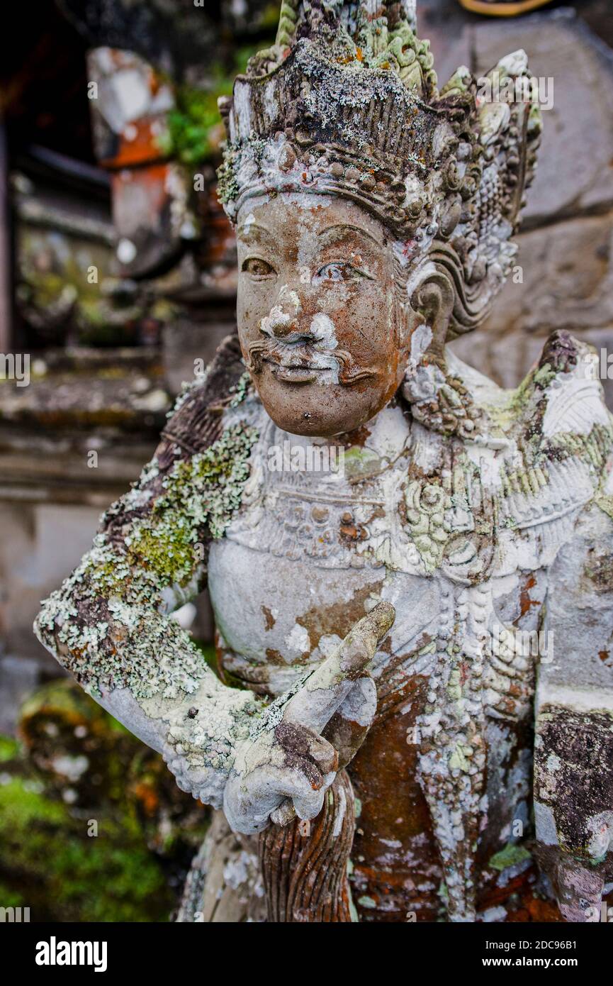 Old, weathered, stone statue at Besakih Temple (Pura Besakih), Bali