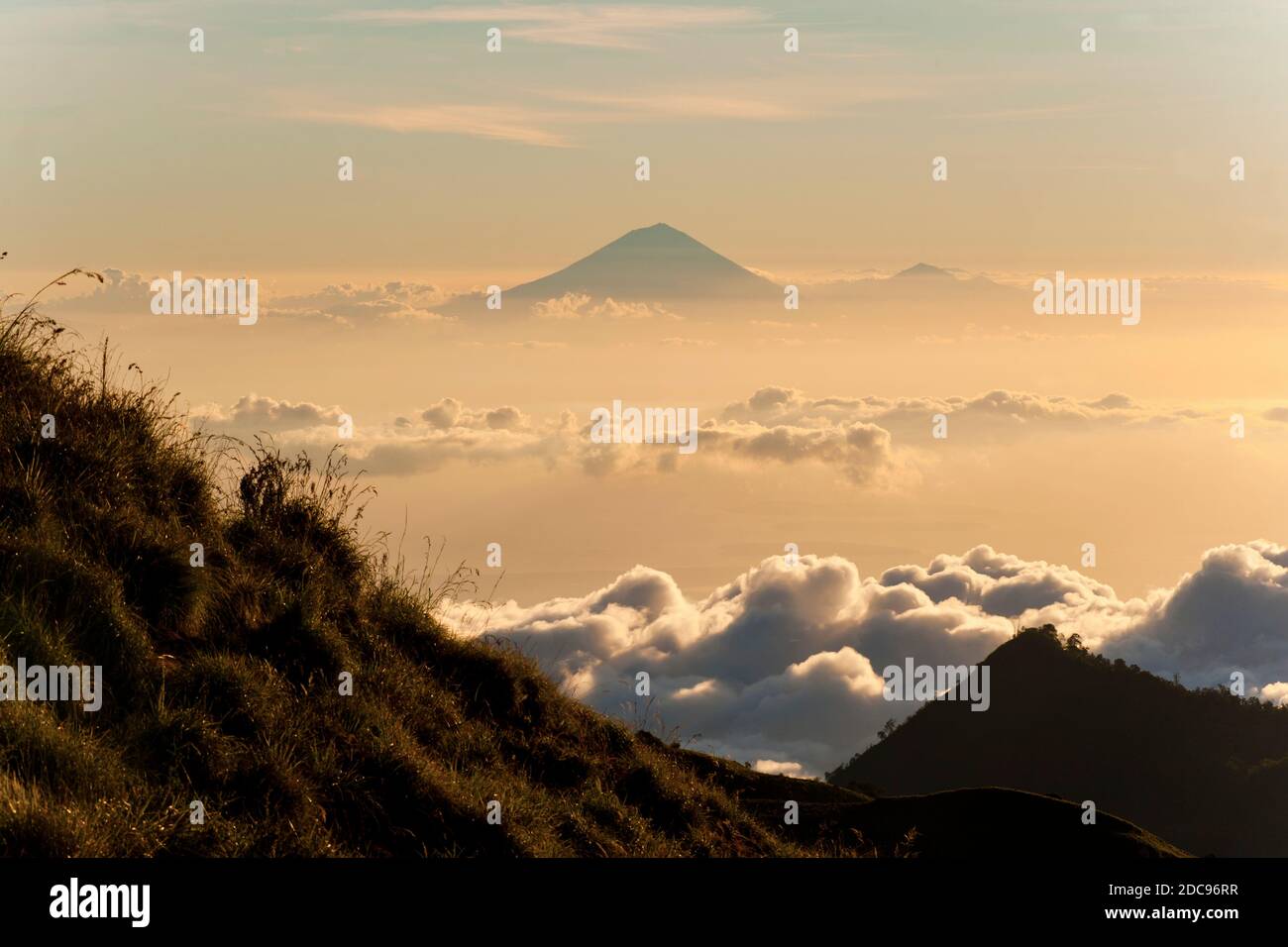 Landscape Photo of the Sunset Behind Mount Agung and Mount Batur on Bali from Mount Rinjani, Lombok, Indonesia, Asia Stock Photo