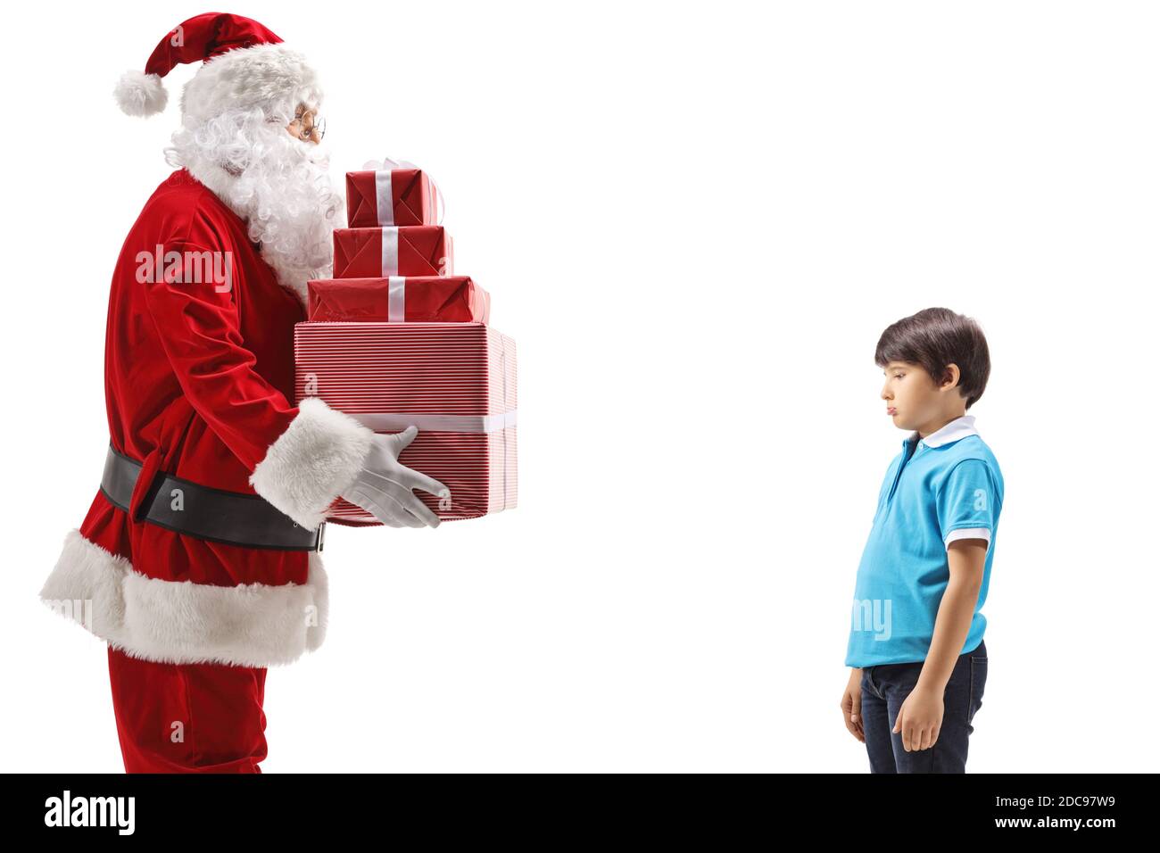 Santa giving presents to a sad boy isolated on white background Stock Photo