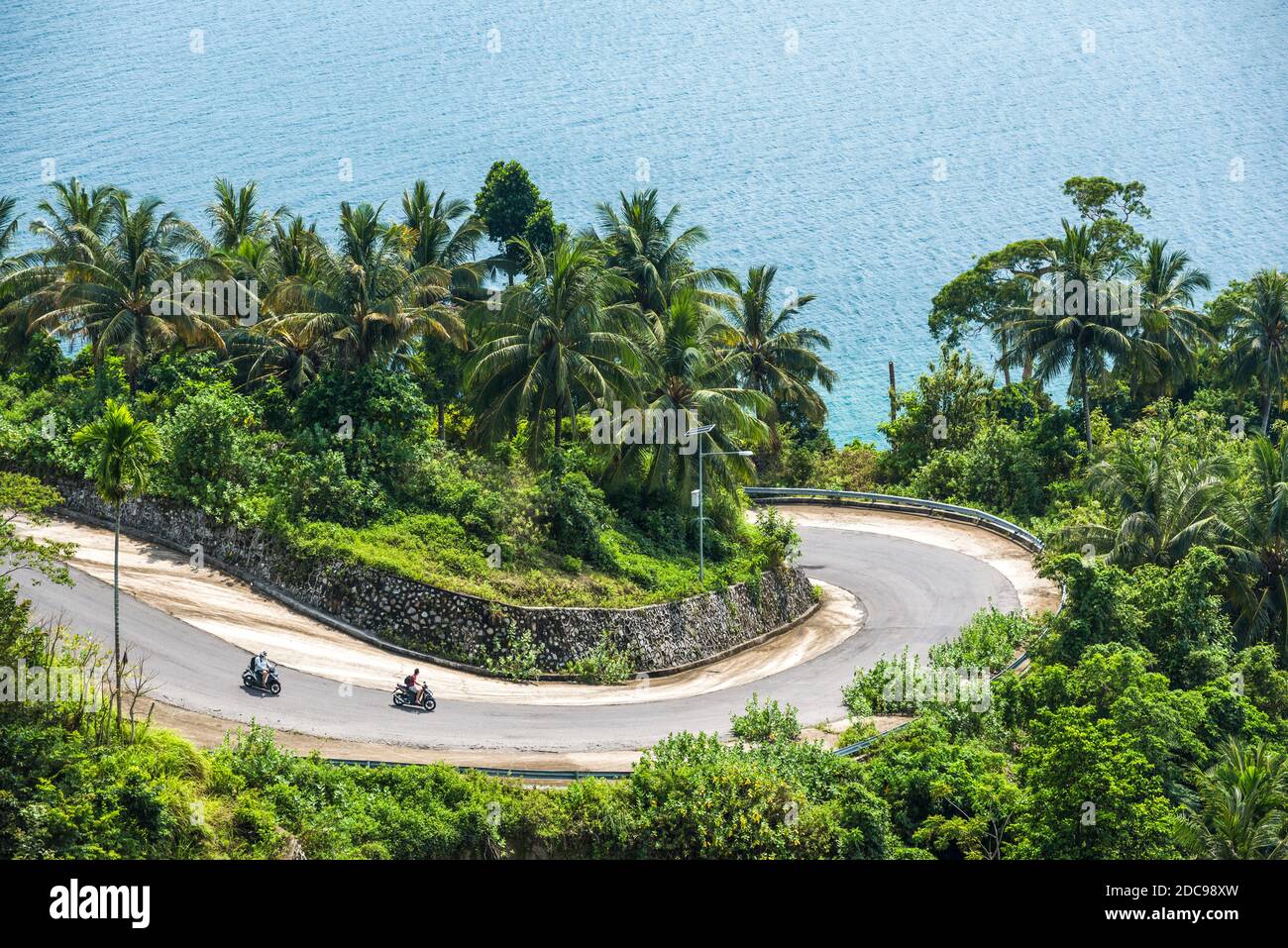 Tourists exploring Pulau Weh Island by Motorcycle, Aceh Province, Sumatra, Indonesia, Asia Stock Photo