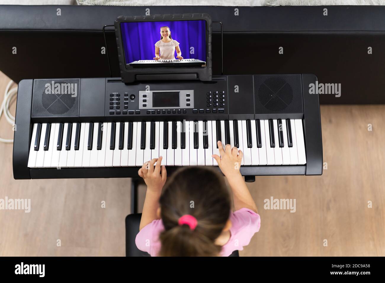 Music Piano Internet Class At Home. Studying Online Stock Photo