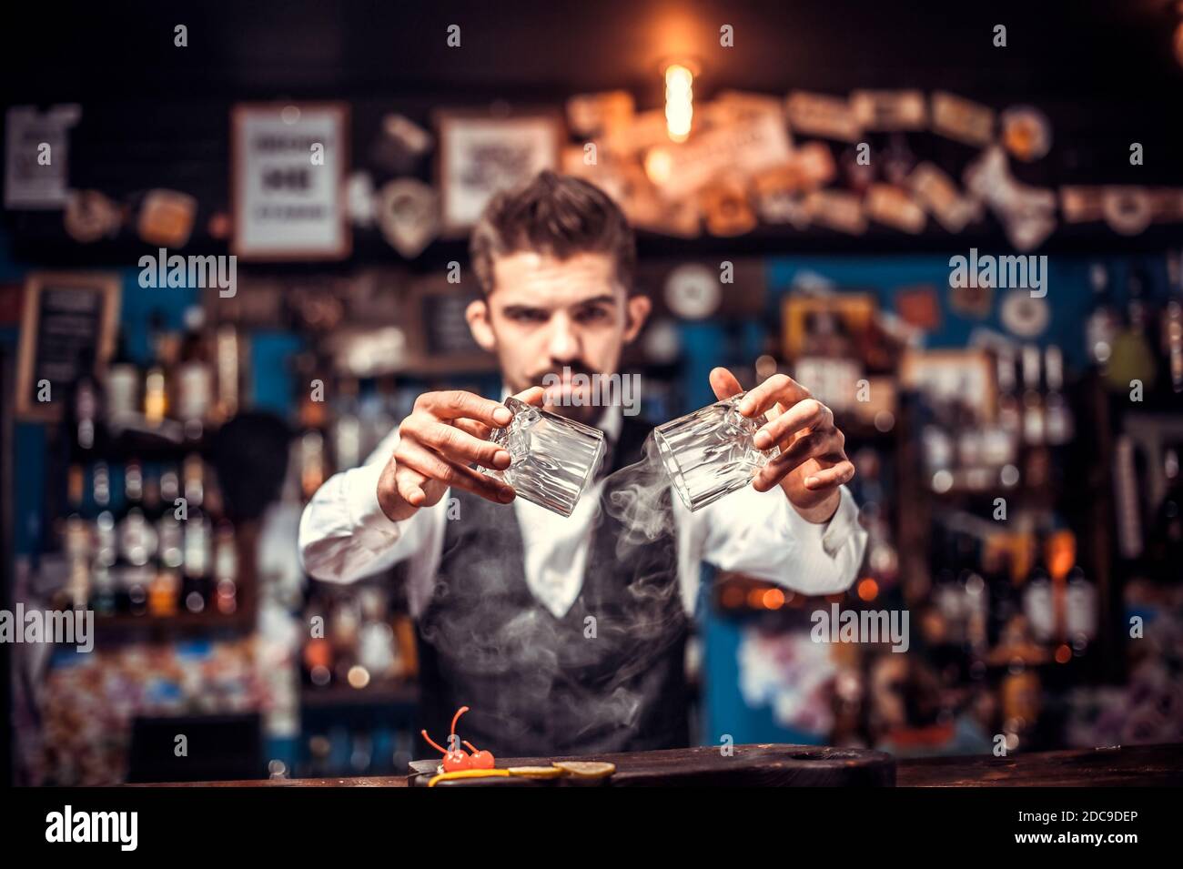 Bartender creates a cocktail at the alehouse Stock Photo