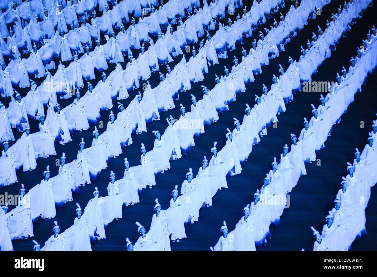 08.08.2012, Pyongyang, , North Korea - Mass choreography and artistic performance with dancers and acrobats at the May Day Stadium during the Arirang Stock Photo