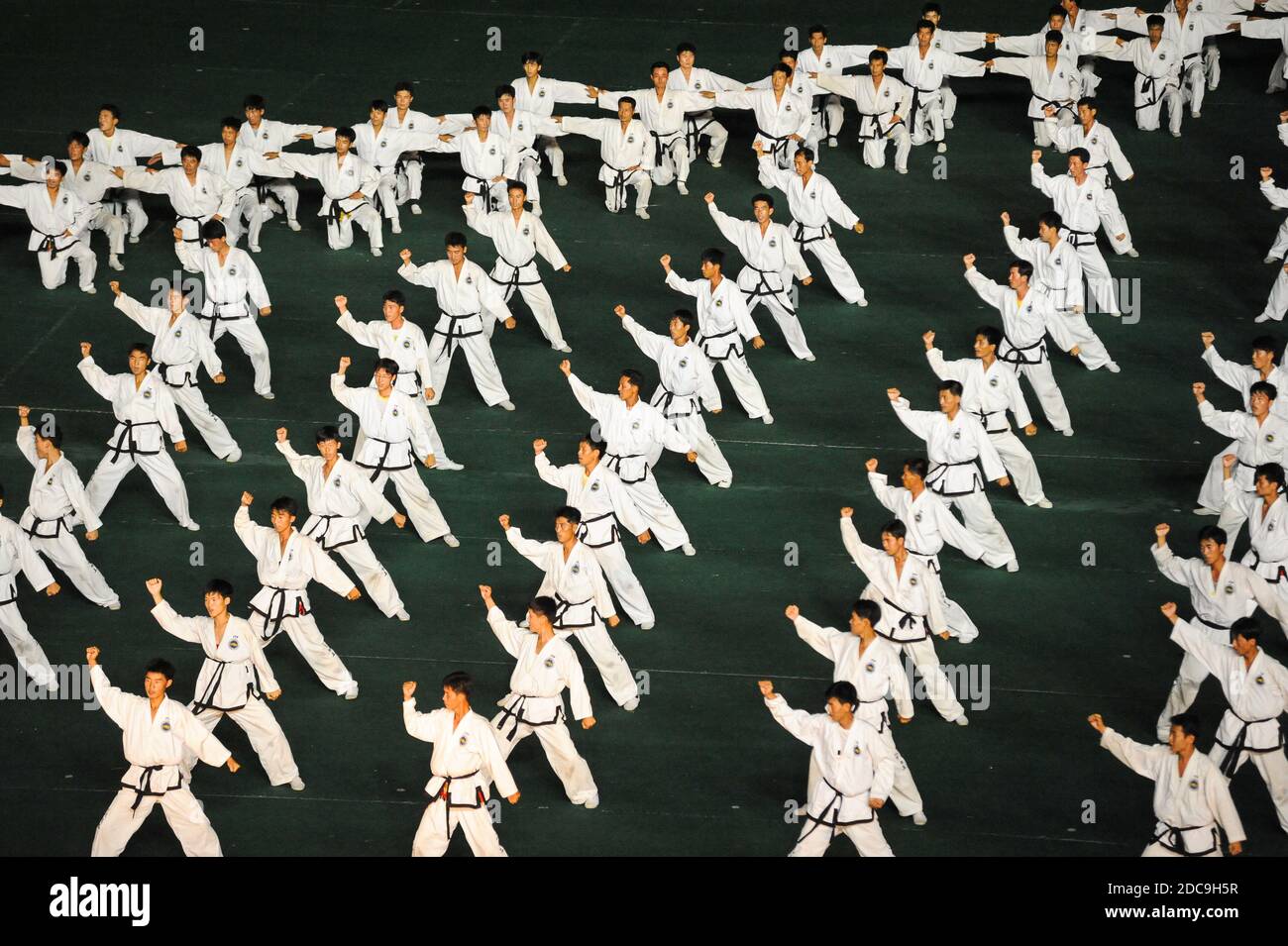 08.08.2012, Pyongyang, , North Korea - Mass choreography and performance of Taekwondo fighters in the First May Stadium during the Arirang Festival an Stock Photo