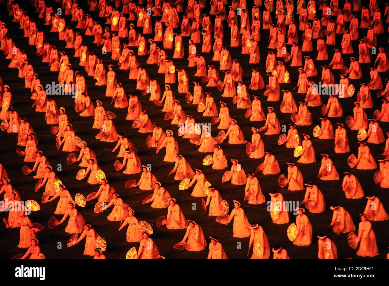 08.08.2012, Pyongyang, , North Korea - Mass choreography and artistic performance with dancers and acrobats at the First May Stadium during the Ariran Stock Photo