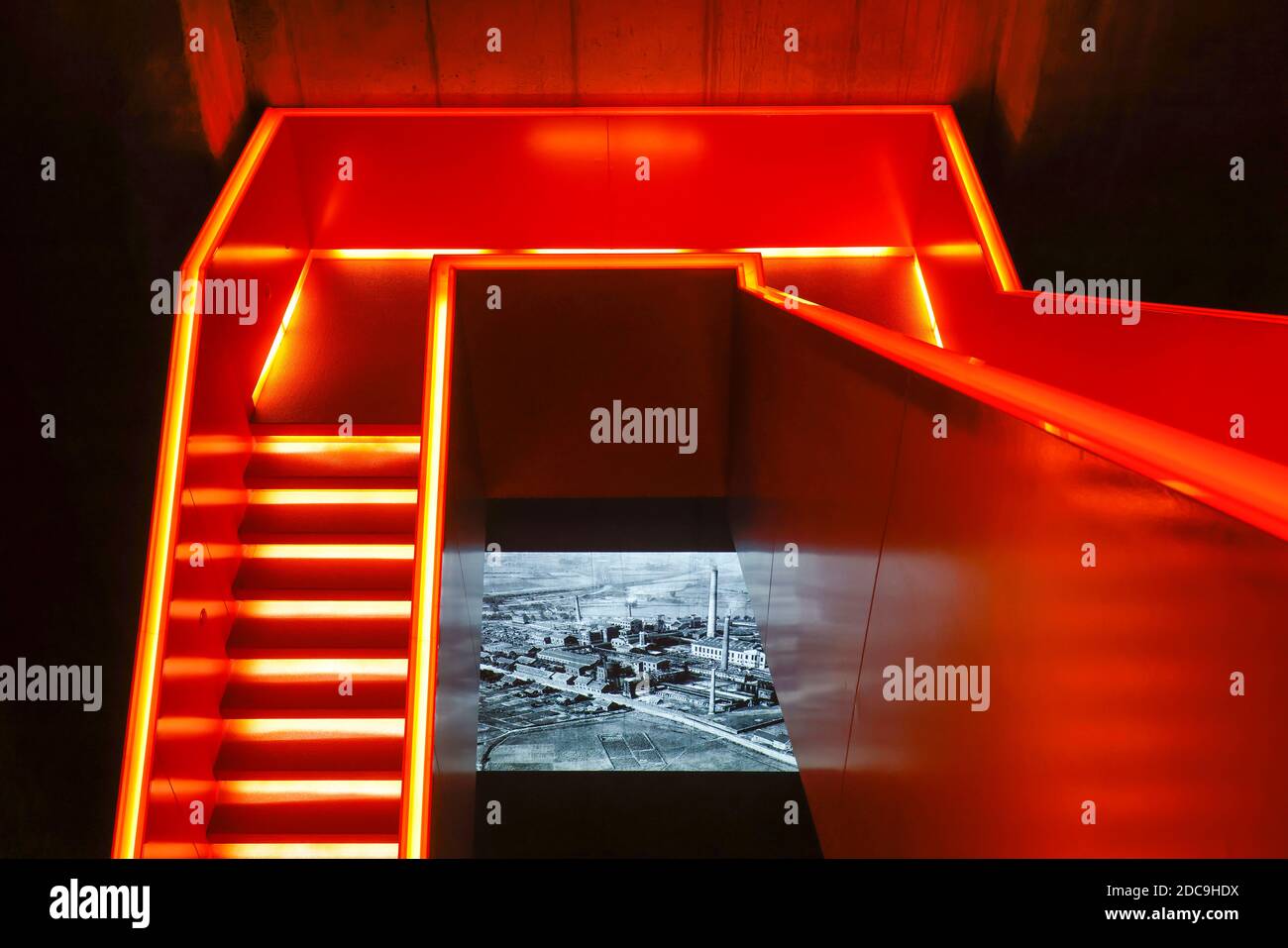 10.10.2020, Essen, North Rhine-Westphalia, Germany - Ruhr Museum at the Zeche Zollverein, UNESCO World Heritage Zollverein, red illuminated staircase. Stock Photo