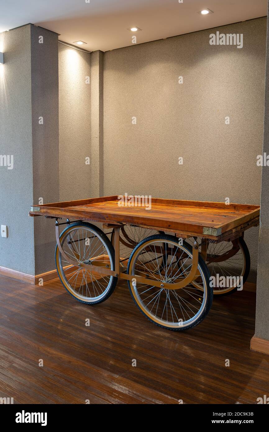Serving trolley with bike wheels Stock Photo Alamy