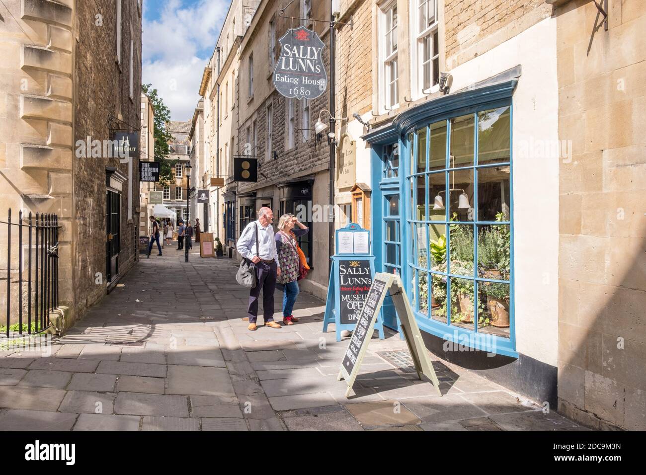 Tourists looking at menu at Sally Lunns Eating House, Bath, Somerset, England, GB, UK Stock Photo