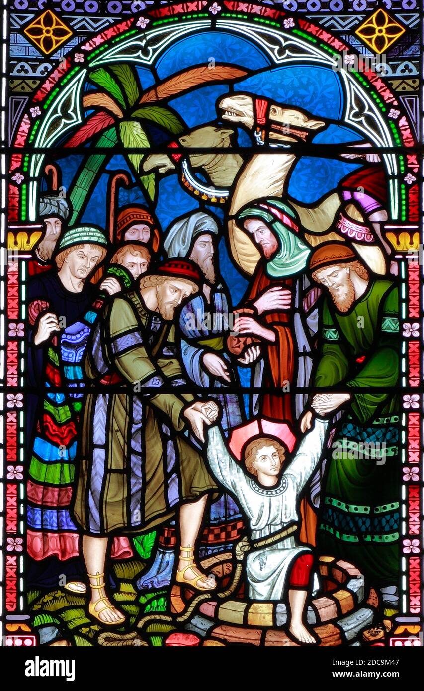 Joseph taken from the Well, to be sold, to The Ishmaelites, Old Hunstanton, detail of stained glass, window by Frederick Preedy, 1867 Stock Photo