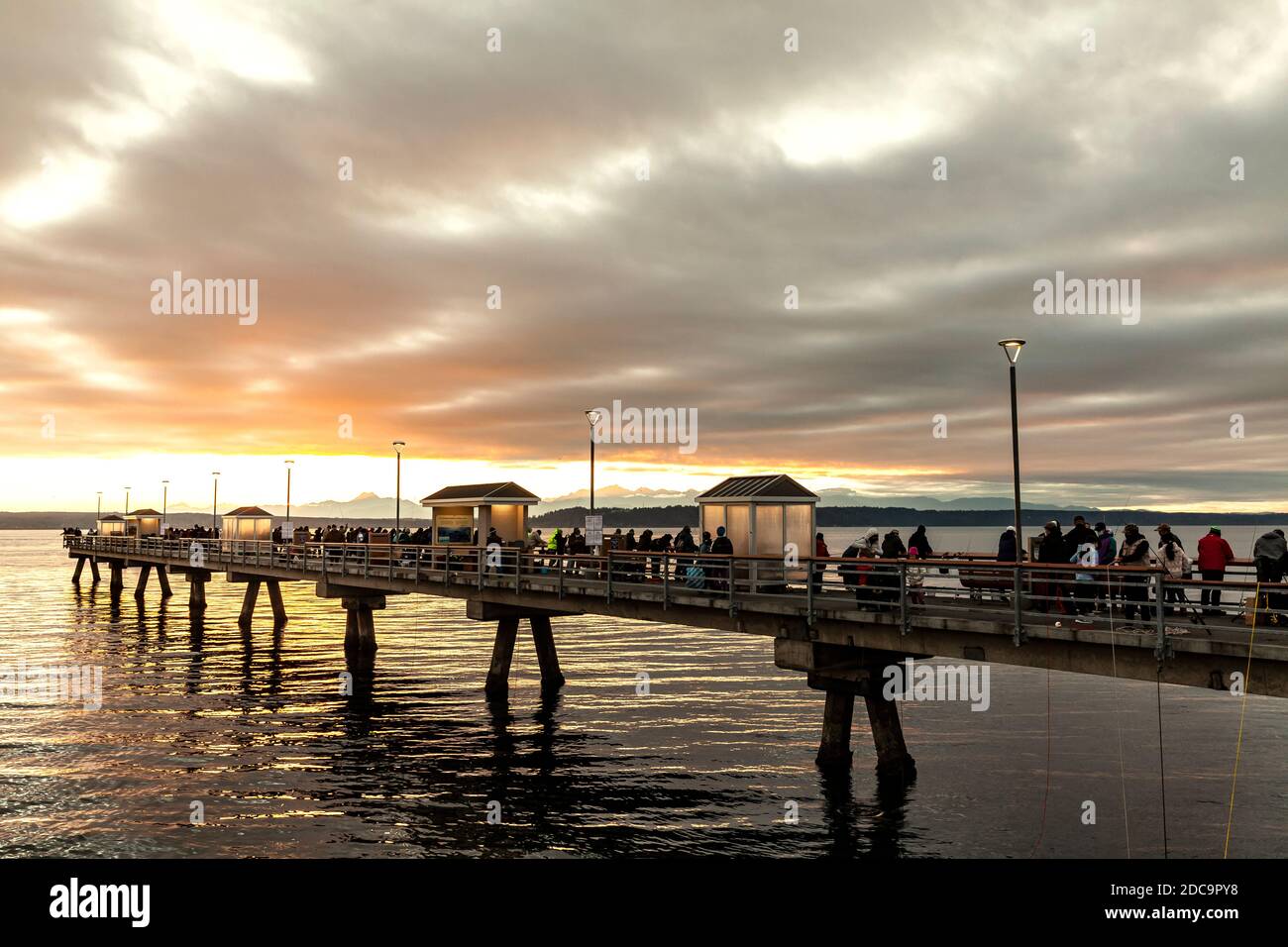 WA17897-00....WASHINGTON -  Edmonds Fishing Pier on the Puget Sound at sunset. Stock Photo