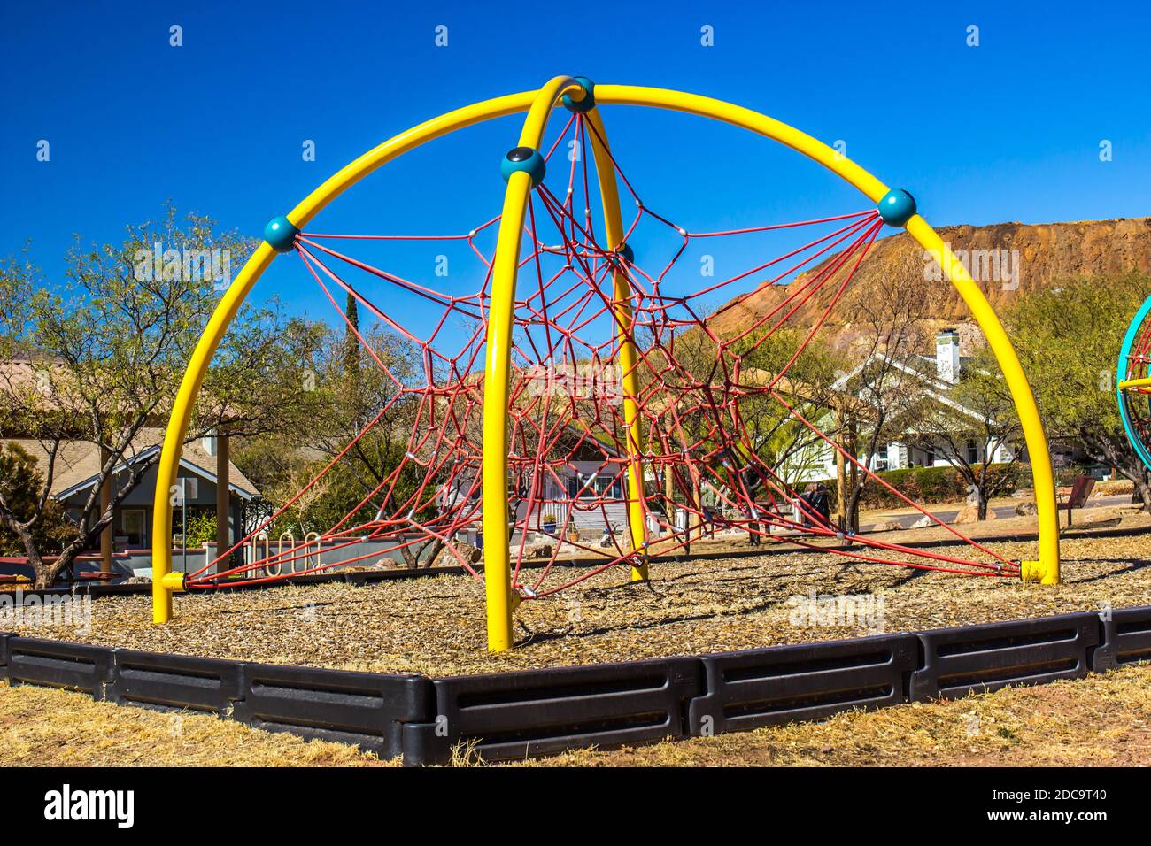 Children's Modern Spider  Climbing Device At Local Playground Stock