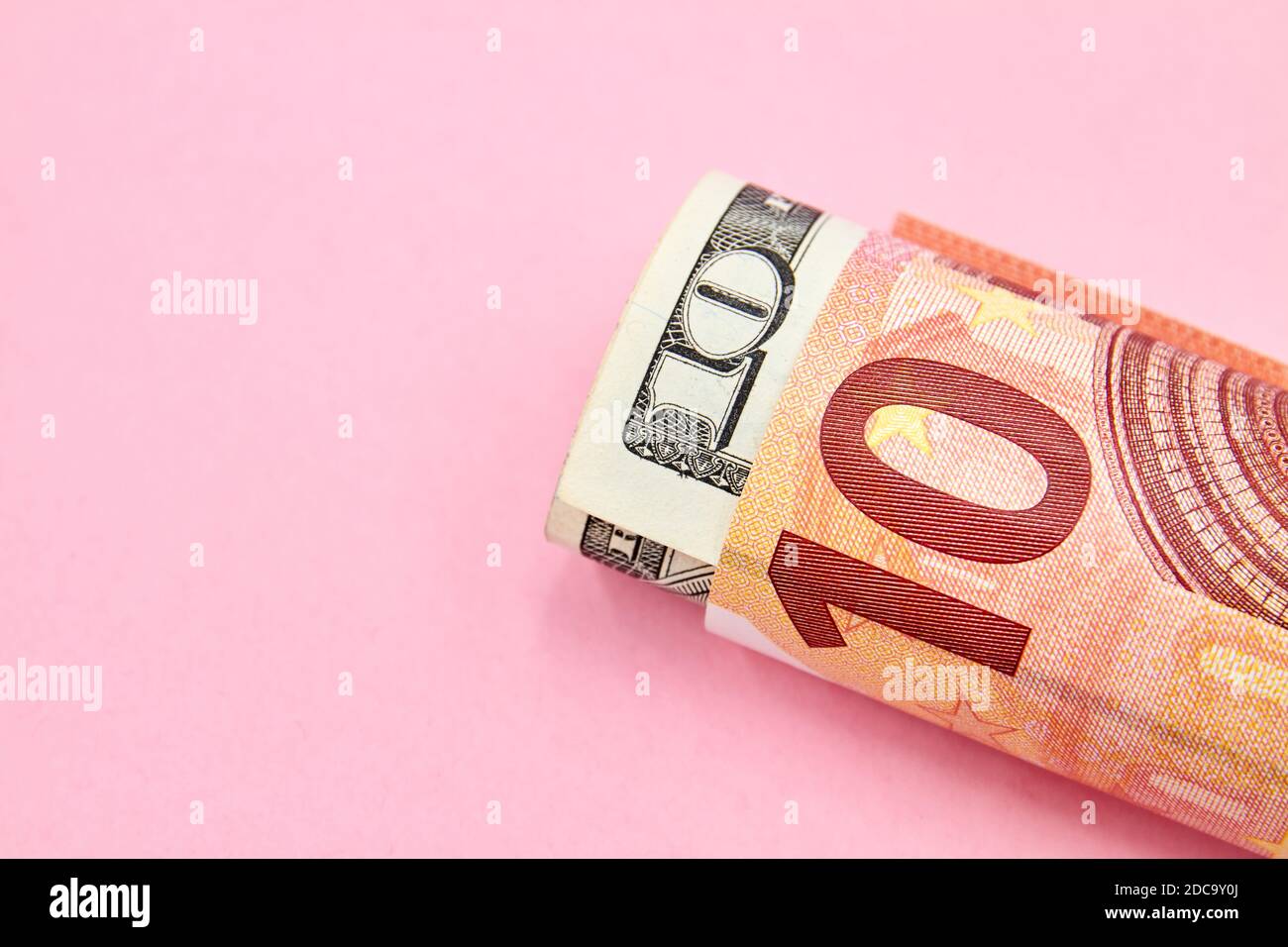 A Roll Of 10 Euro And 10 US Dollar Bills On A Pink Background With Copy Space Stock Photo Alamy a-roll-of-10-euro-and-10-us-dollar-bills-on-a-pink-background-with-copy-space-stock-photo-alamy