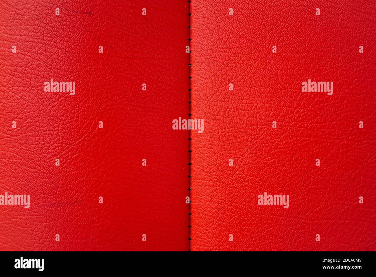 Red leather texture from sofa can be use as background Stock Photo