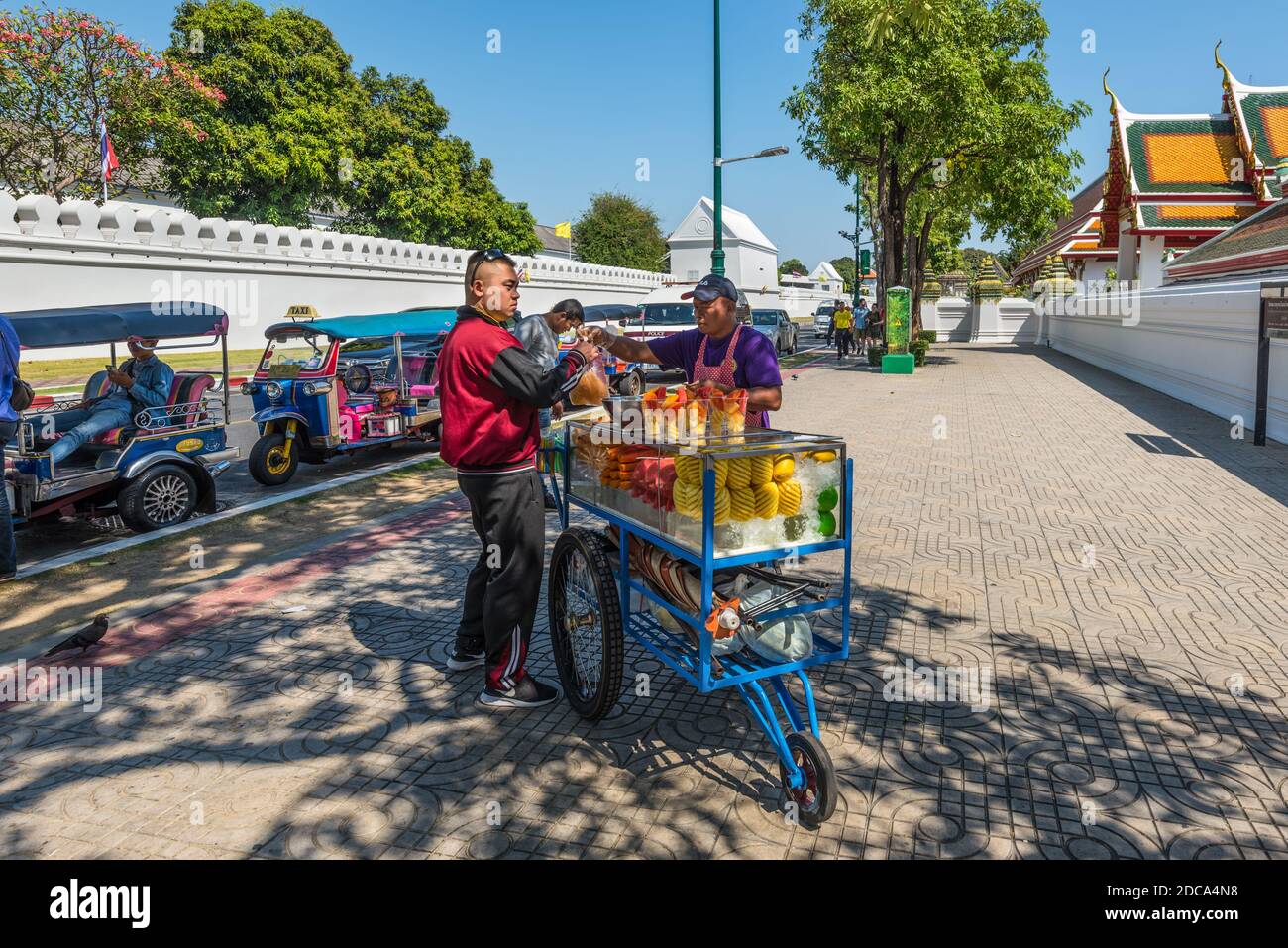 Bangkok, Thailand December 7, 2019 A fruit cart vendor is selling