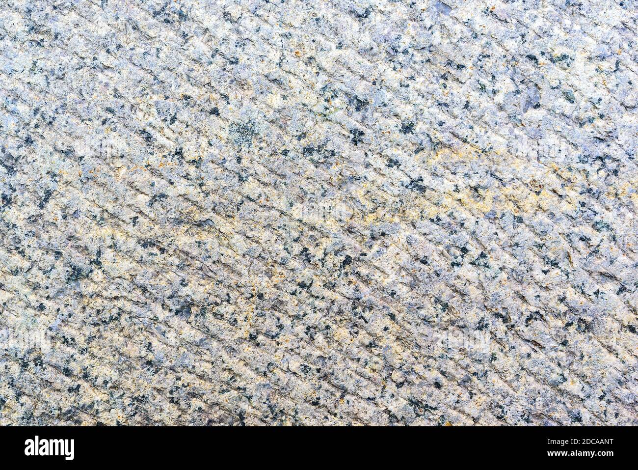 Granite stone texture with speckled surface pattern Stock Photo