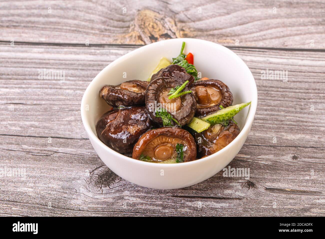 Marinated shiitake mushrooms with herbs and spices Stock Photo Alamy