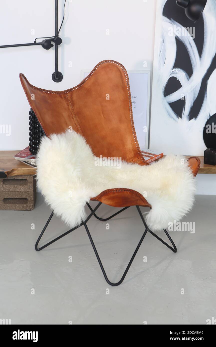 Leather armchair in the living room Stock Photo Alamy