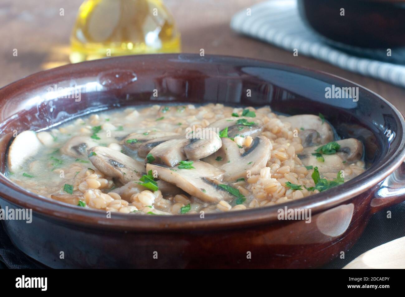Soup with spelled and mushrooms Stock Photo