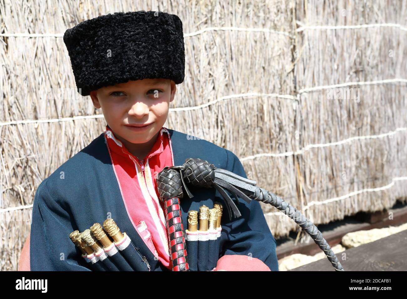 Portrait of kid in a Cossack costume Stock Photo