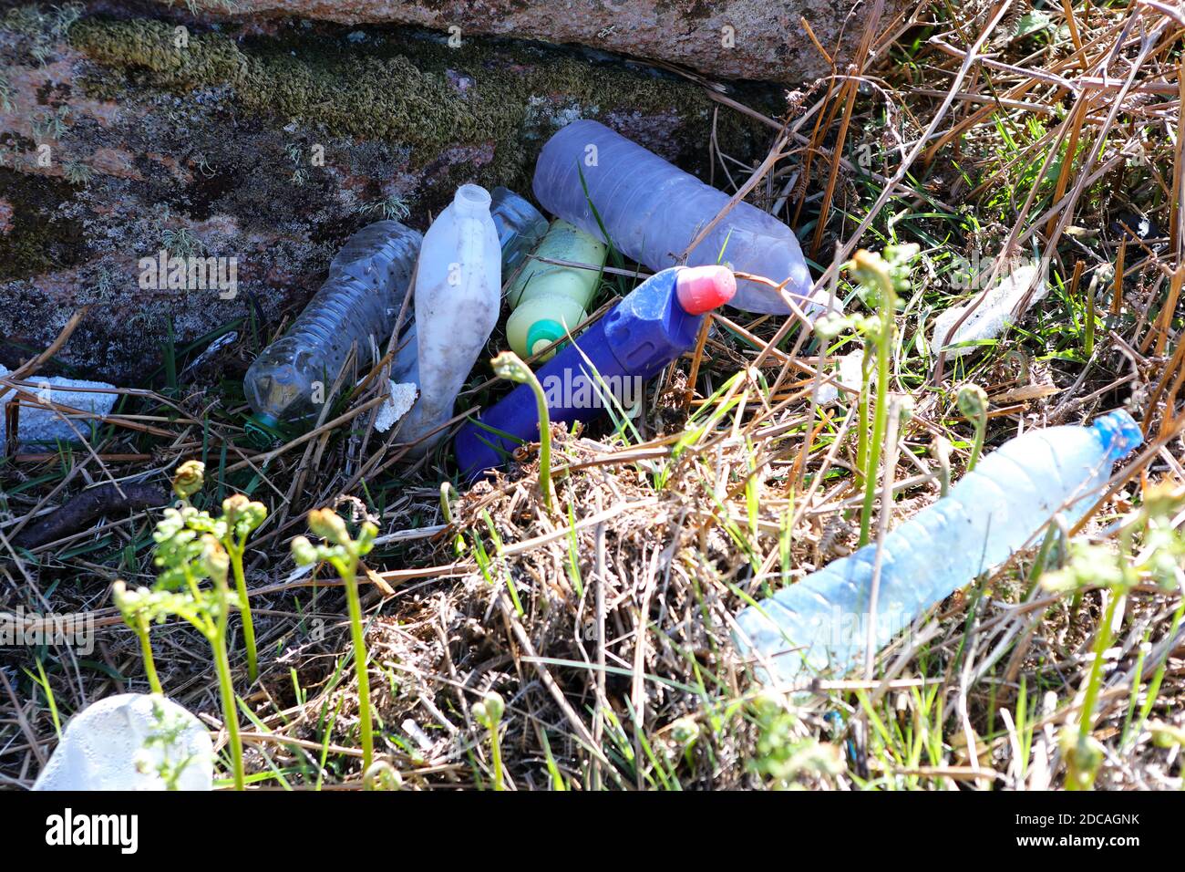 Plastic rubbish washed up on the coastline from the sea Stock Photo