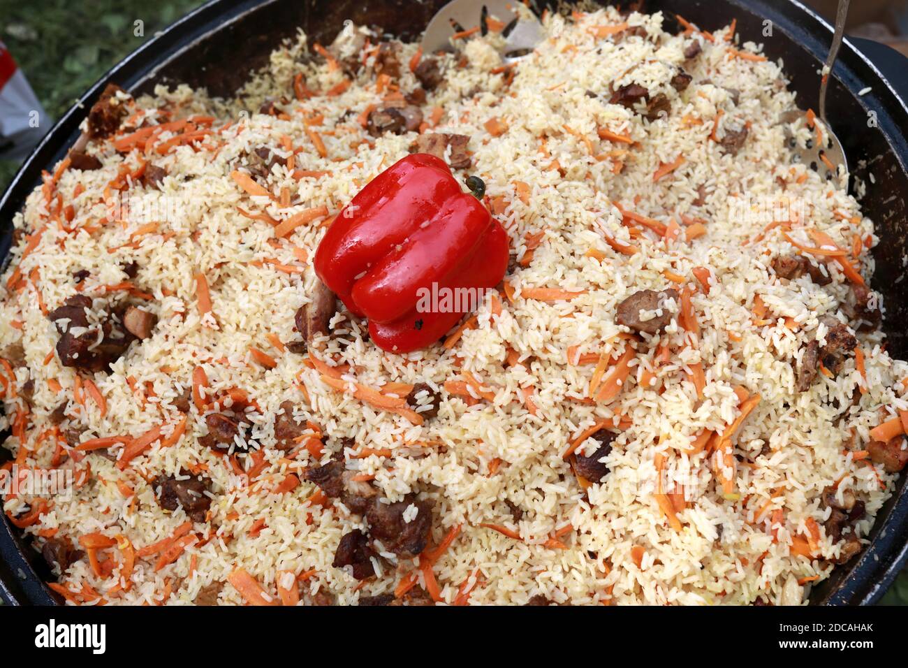 Pilaf cooked in a cauldron on picnic Stock Photo Alamy
