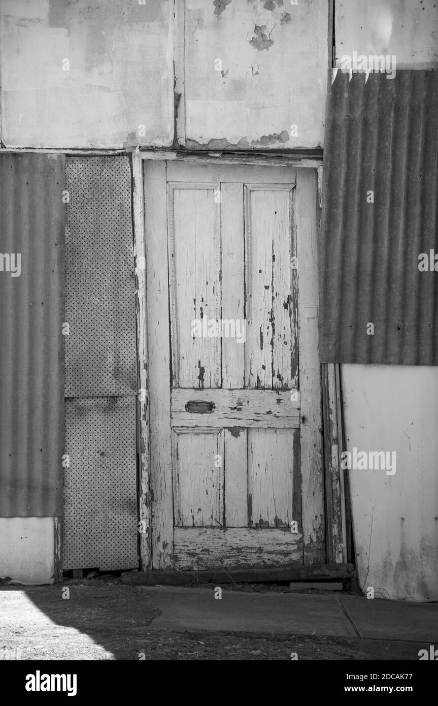 Doorway of an abandoned shopfront in the remote wheat-farming township of Patchewollock, Victoria, Australia Stock Photo