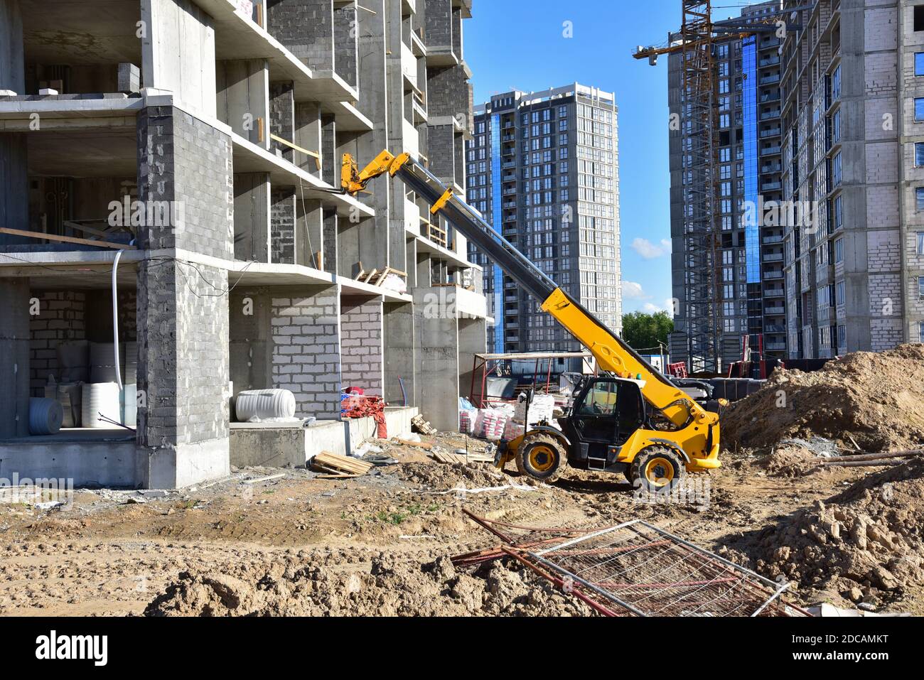 Telescopic handler work at the construction site. Construction ...