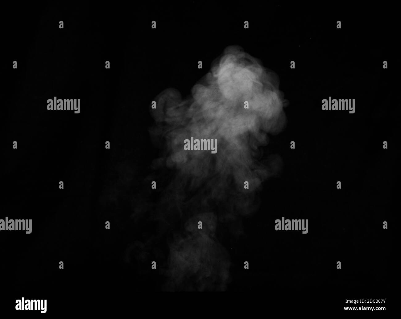 White smoke on black background. Figured smoke on a dark background. Abstract background, design element, for overlay on pictures Stock Photo