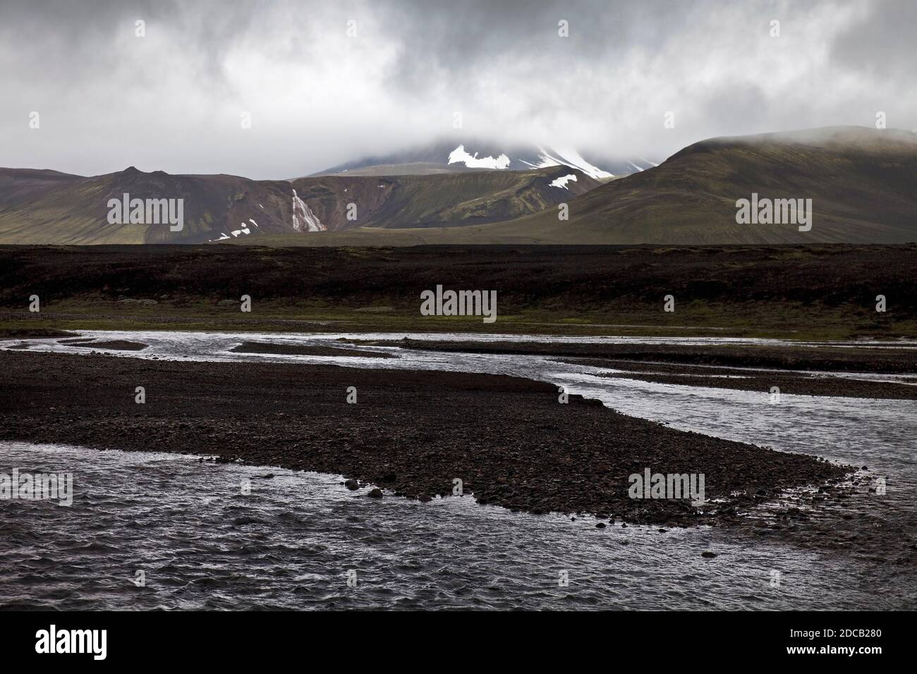 black lava landscape with the river Raudfossakvisl, Iceland, Fjallabak National Park, Landmannaleid Stock Photo
