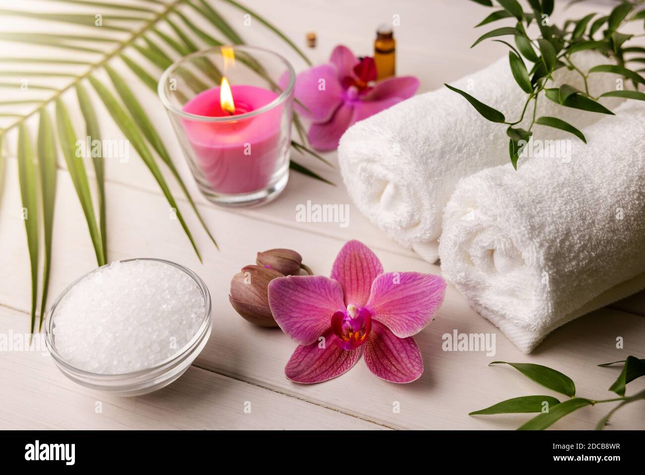 spa salt treatment. spa items on white wooden table Stock Photo