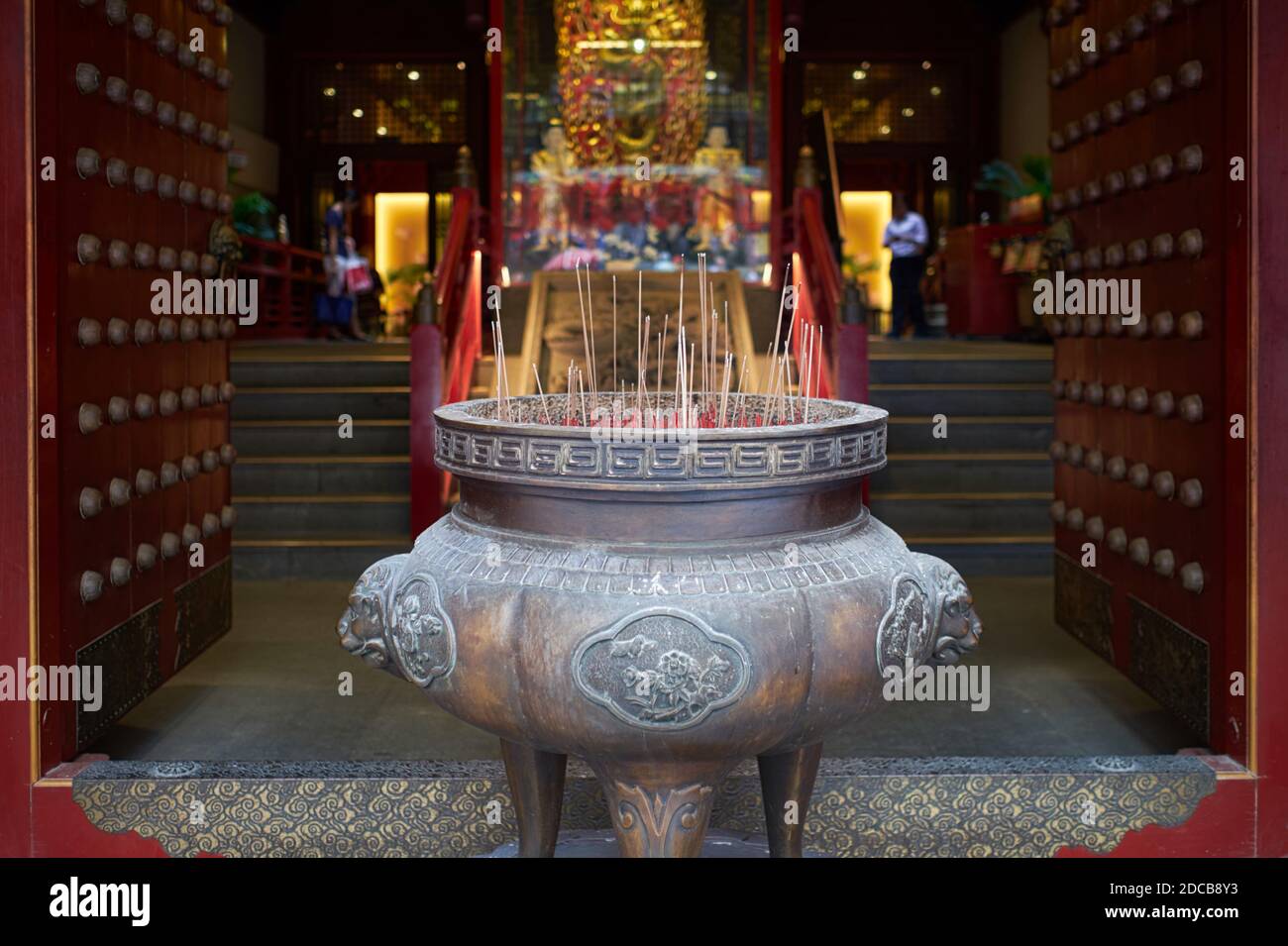 An incense burner with joss sticks at Buddha Tooth Relic Temple and