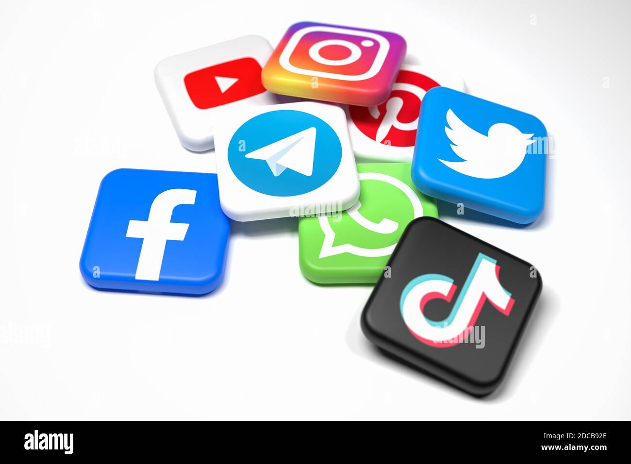 Logos of the major social media and messaging sites (Youtube, Instagram,  Pinterest, Twitter, Facebook, Whatsapp, Telegram, Tiktok) on a heap  isolated Stock Photo - Alamy