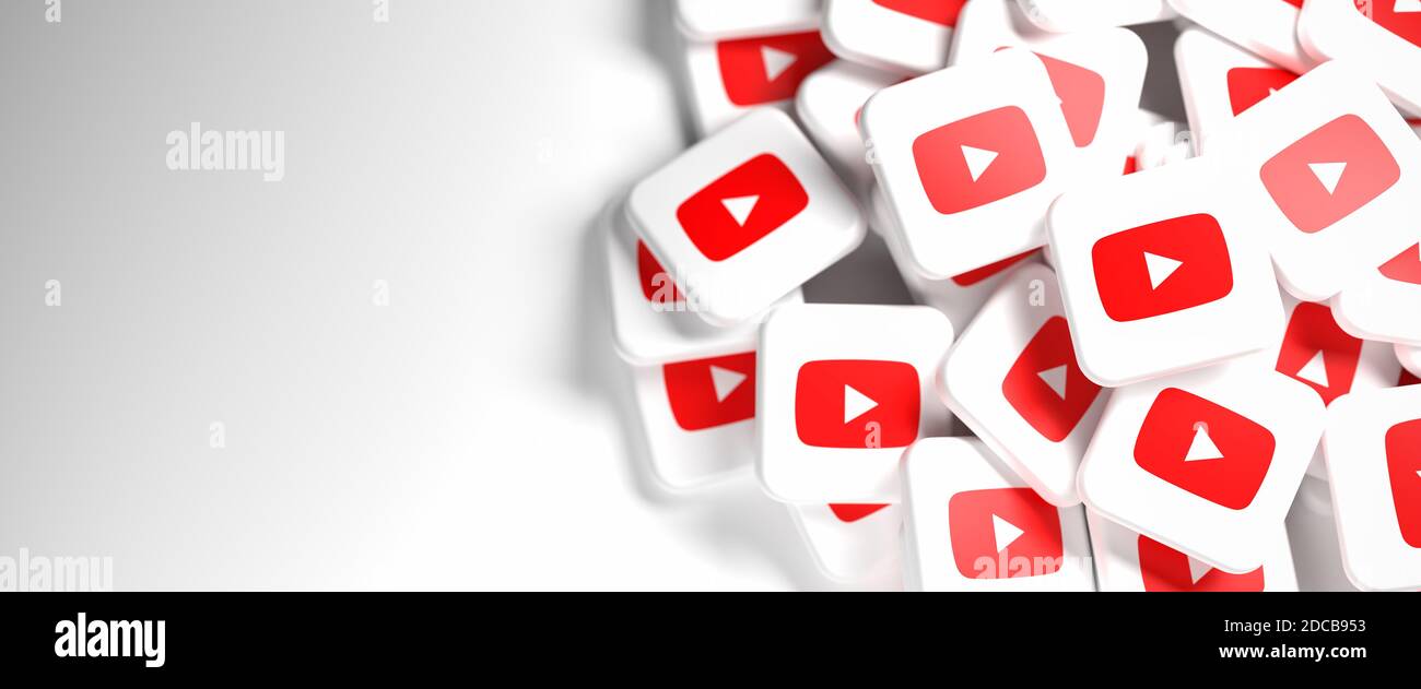 Logos of the social media video site and app Youtube on a heap. Web banner size with copy space - Selective focus Stock Photo