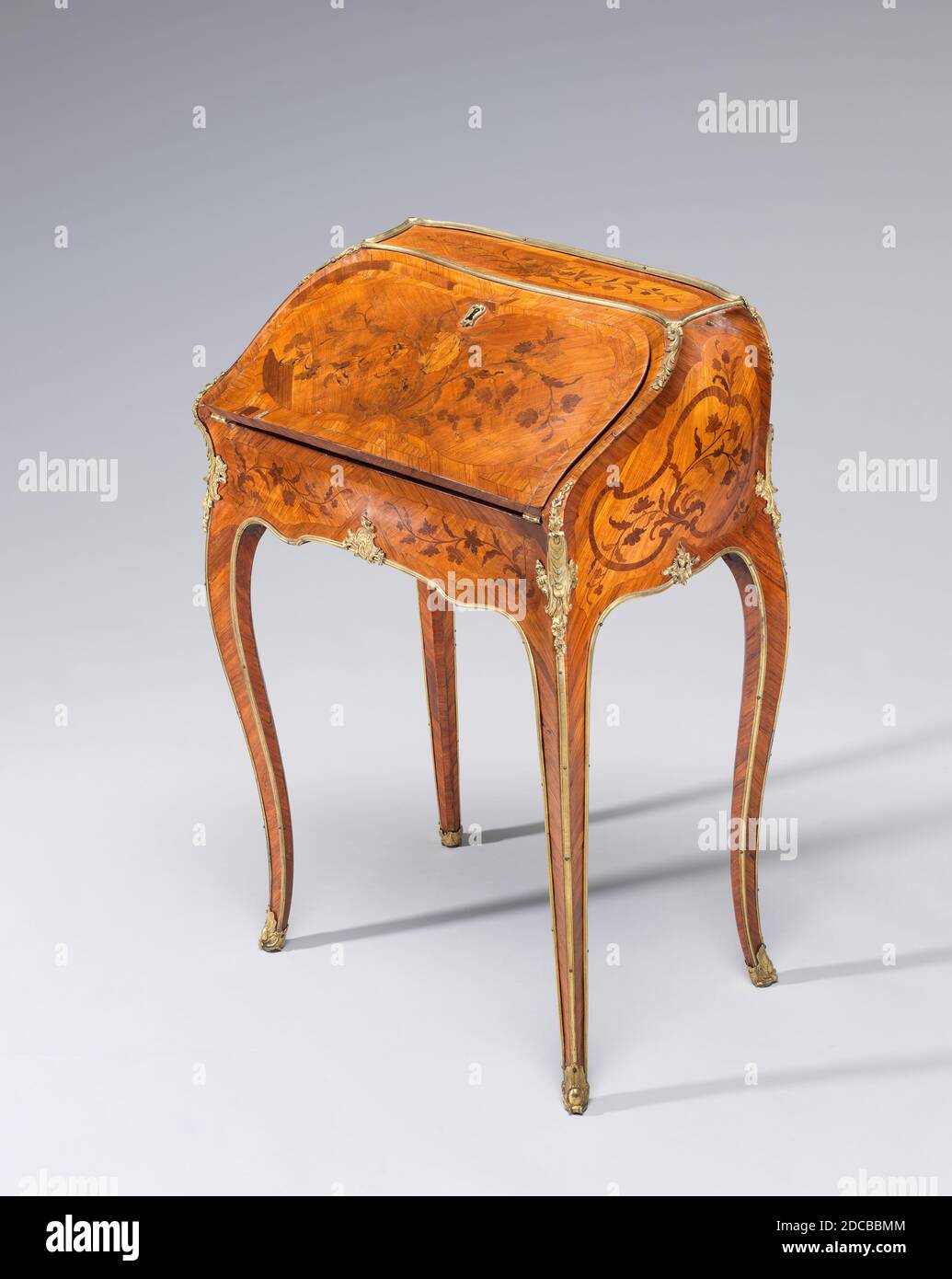 Bernard Vanrisamburgh II, (cabinetmaker), French, active c. 1730 - 1765/1766, Lean-to Writing Desk (secrétaire en pente), c. 1750, veneered on oak (stained purple on the underside of the top) with tulipwood cut on the quarter, root-cut kingwood, and other end-cut woods; gilded bronze mounts, overall: 80 x 53.3 x 35.8 cm (31 1/2 x 21 x 14 1/8 in Stock Photo