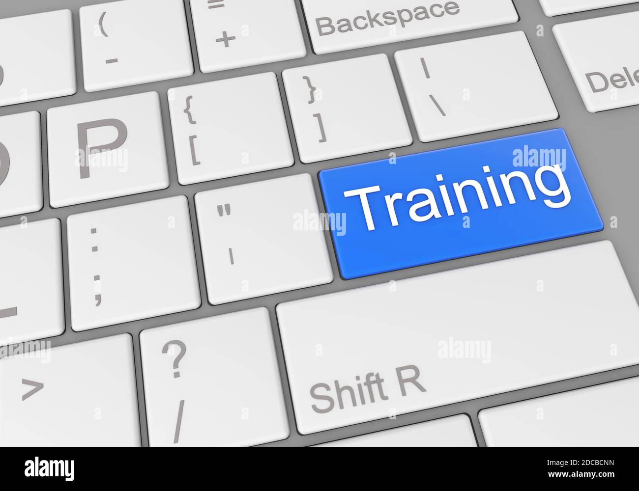 A special blue "training" button on a laptop keyboard Stock Photo