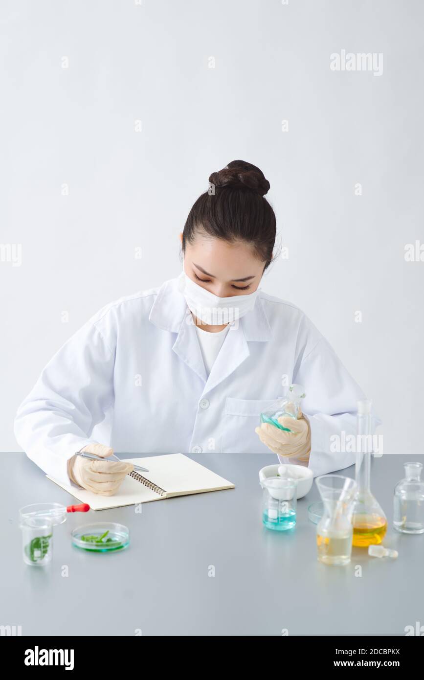 the scientist, dermatologist formulate organic natural cosmetic product in the laboratory Stock Photo