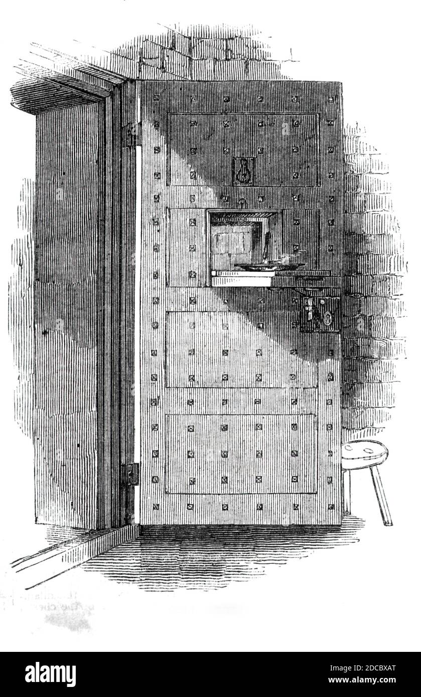 Cell door, 1842. Metal door with hatch for food, Pentonville Prison, London, completed in 1842. From &quot;Illustrated London News&quot;, 1844, Vol I. Stock Photo