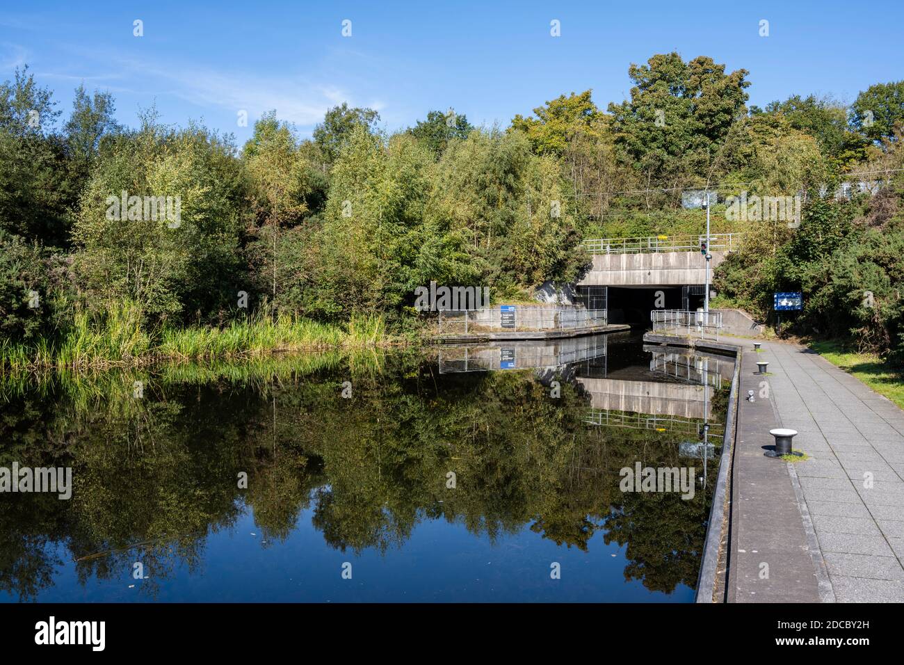 Canal basin and entrance to Roughcastle Tunnel and aqueduct leading to the Falkirk Wheel in Falkirk, Scotland, UK Stock Photo