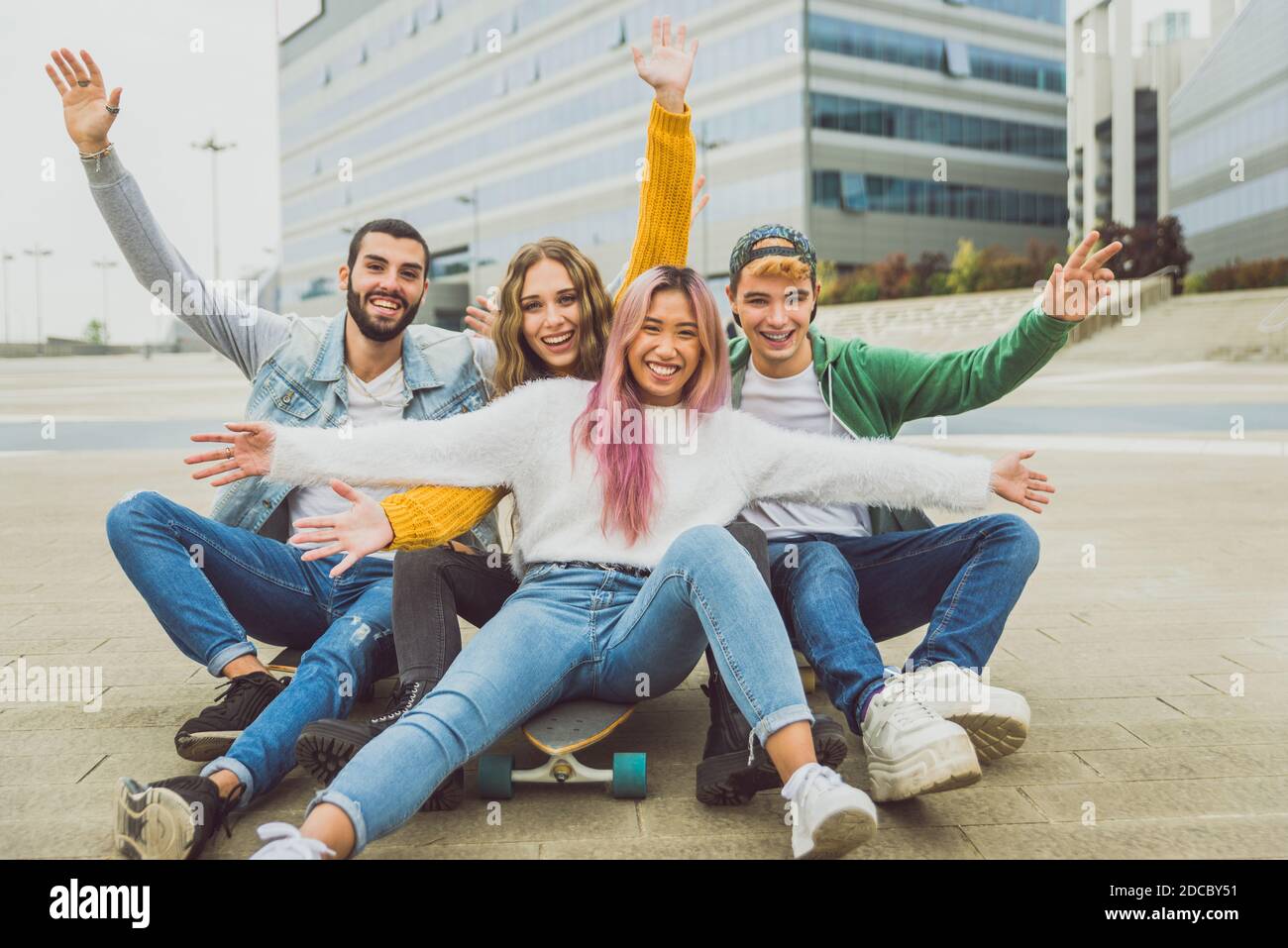 happy-young-people-meeting-outdoors-group-of-cheerful-teenagers