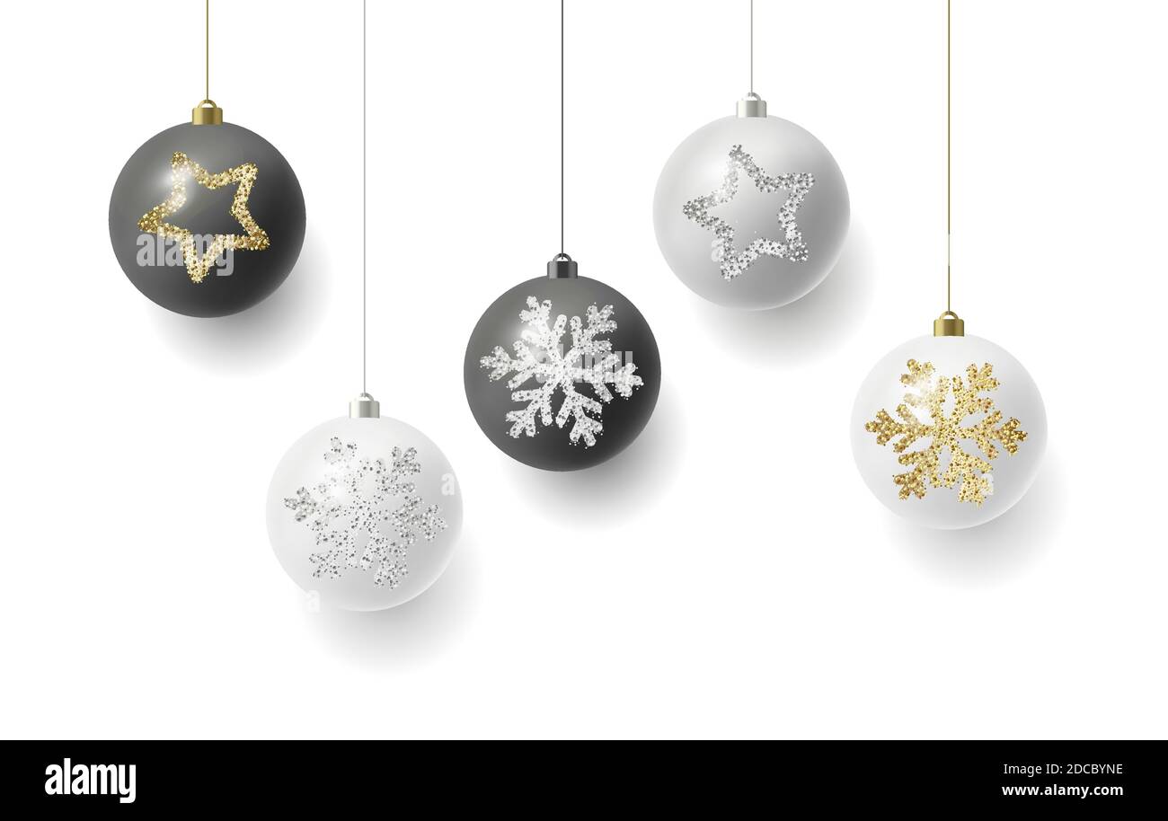 Christmas balls hanging on strings, white and black colour with silver ...