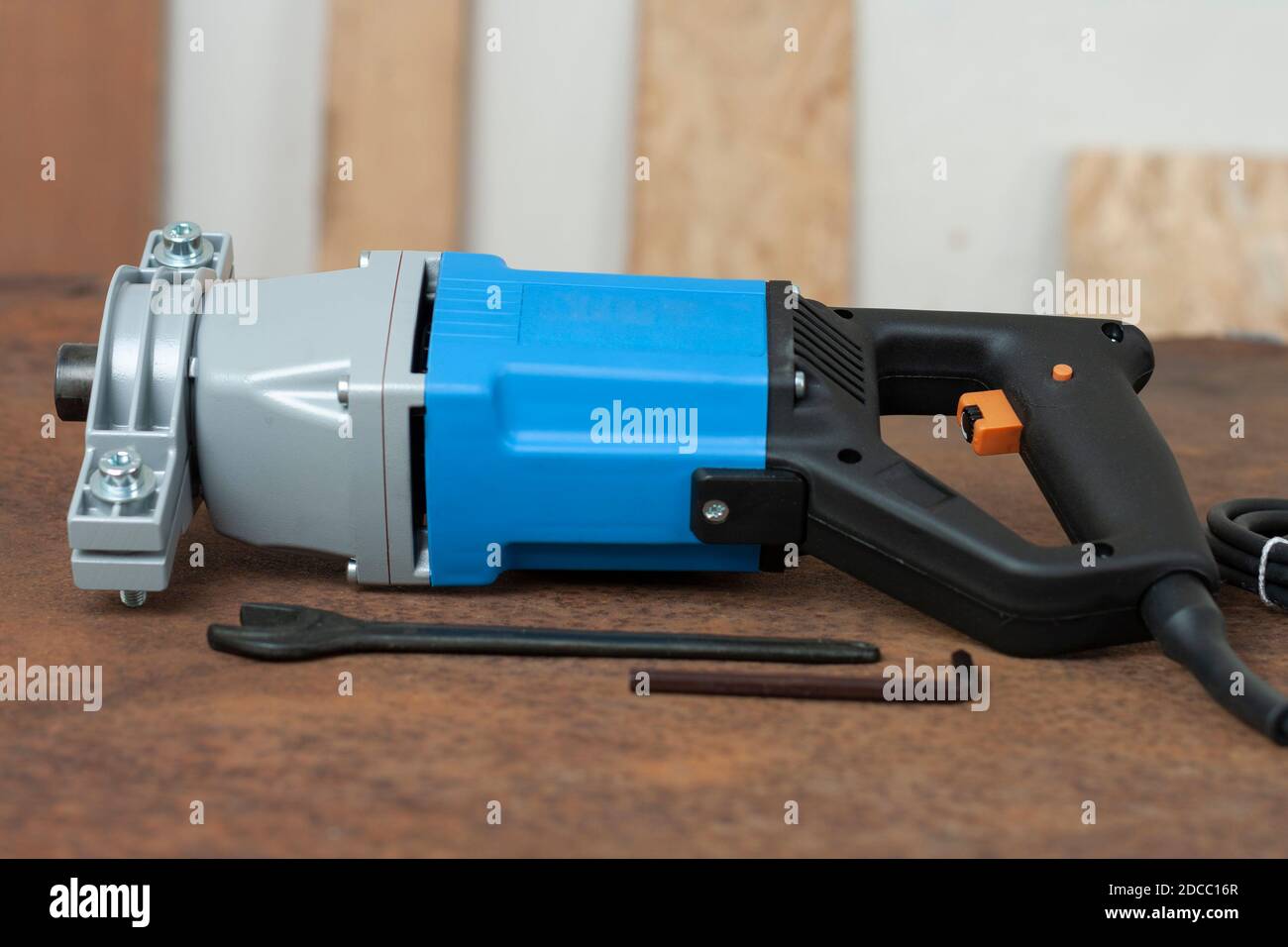 Wrench and mixing drill for mixing of mortar, paint , plaster and