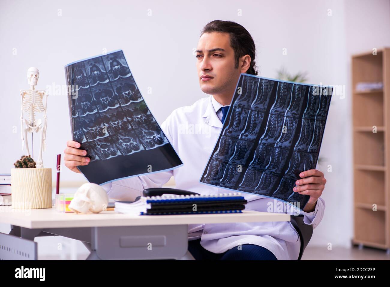 Young doctor radiologist working in the clinic Stock Photo - Alamy