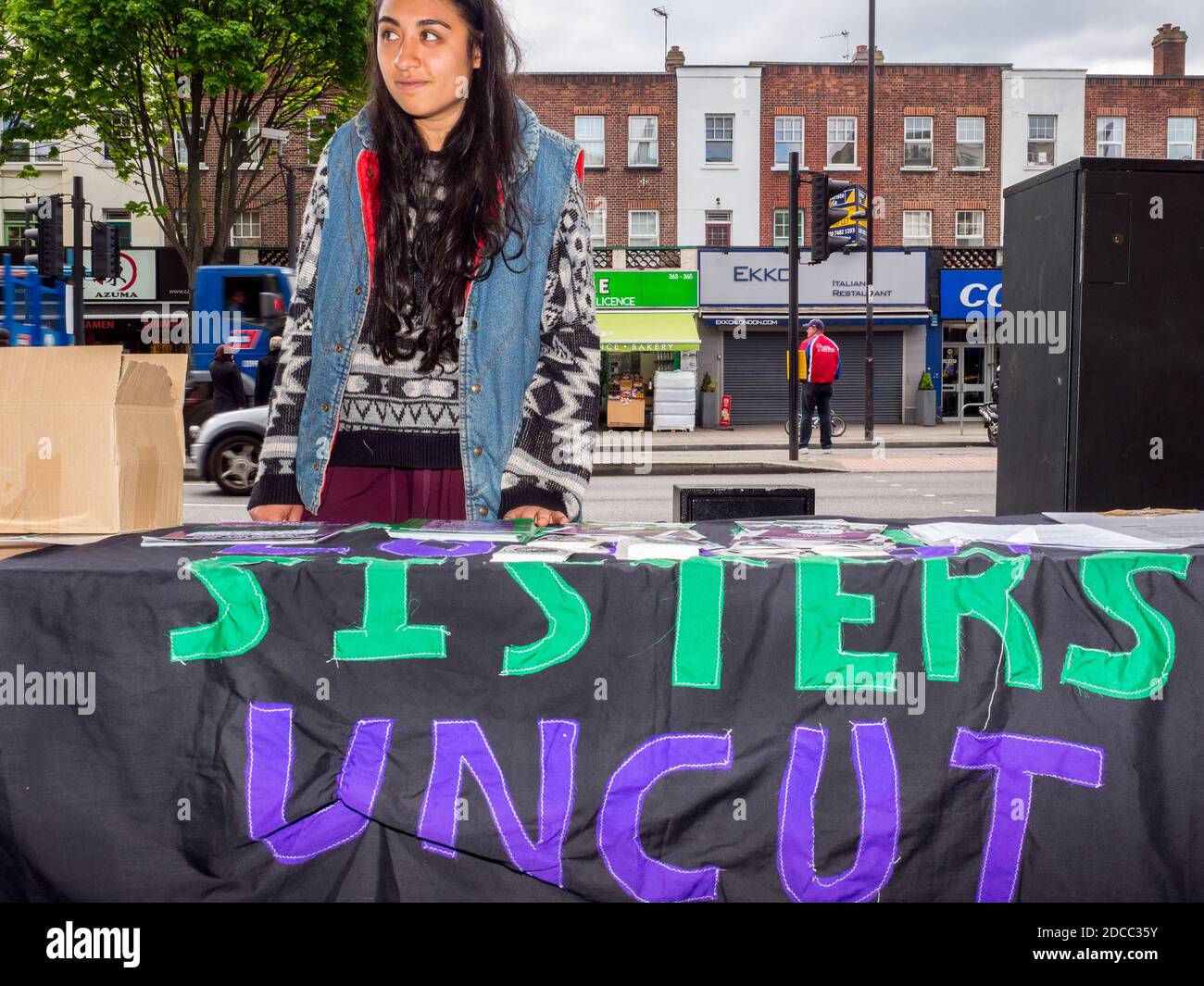 25 year old, self-employed Kelsey, raising awareness for Sisters Uncut, a feminist group taking direct action for domestic violence services. Stock Photo