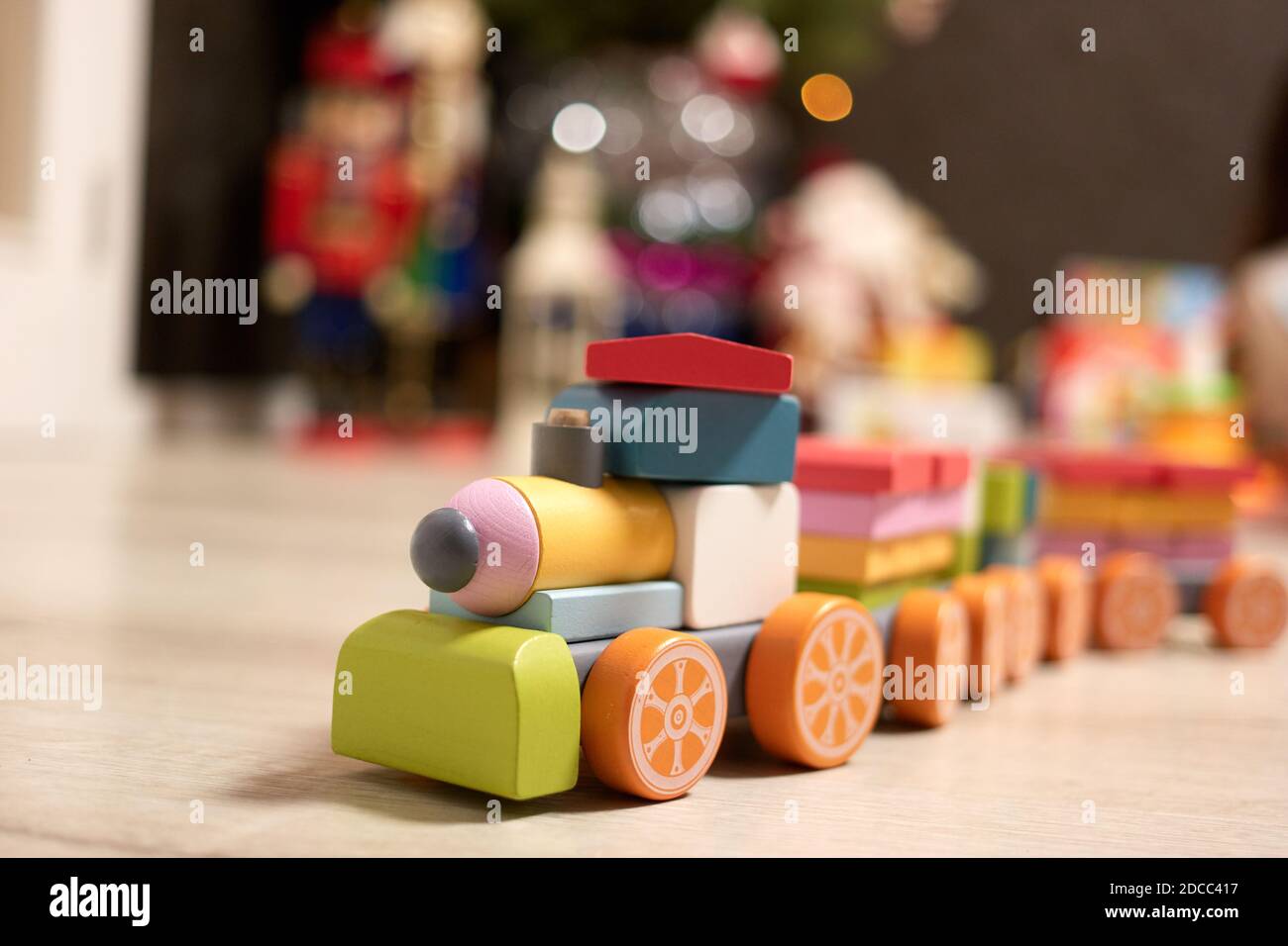 Toy train constructor made of wooden blocks Stock Photo - Alamy