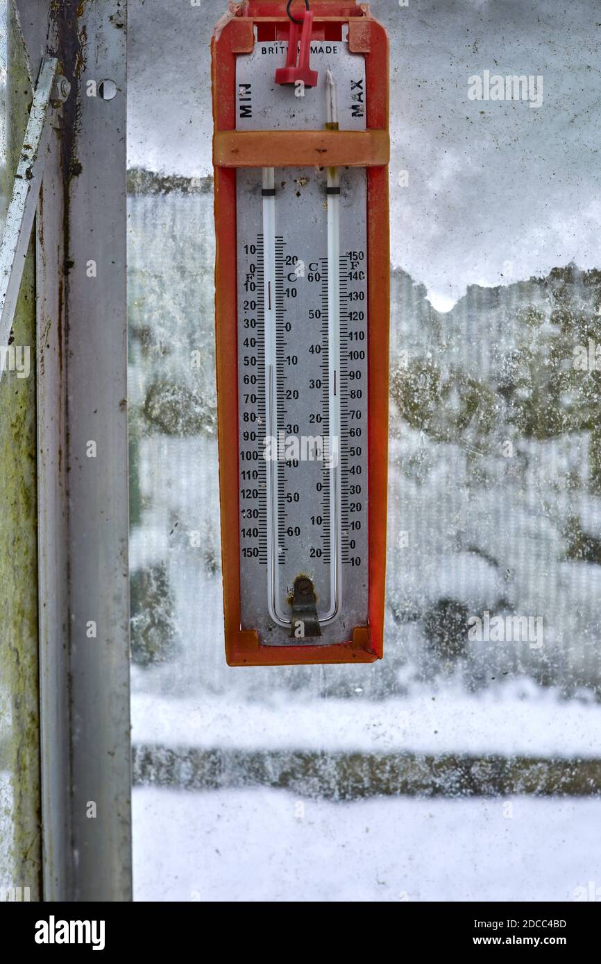Winter and a Max and Min thermometer hanging inside an unheated ...